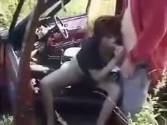 Outside, fucking a sexy British milf on the car's bonnet